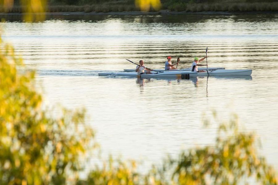 Kayaks going down the river in East Perth
