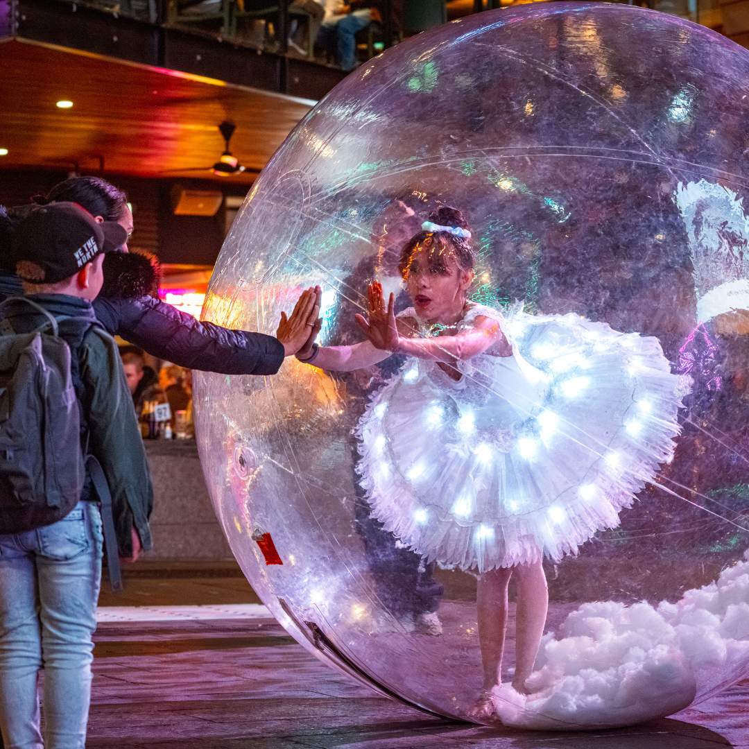 Ballerina performer in giant bubble at Yagan Square