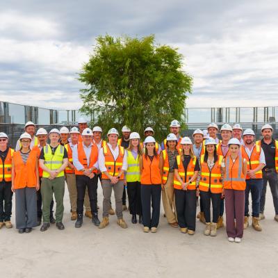 Stakeholders celebrating at the Topping Out Ceremony